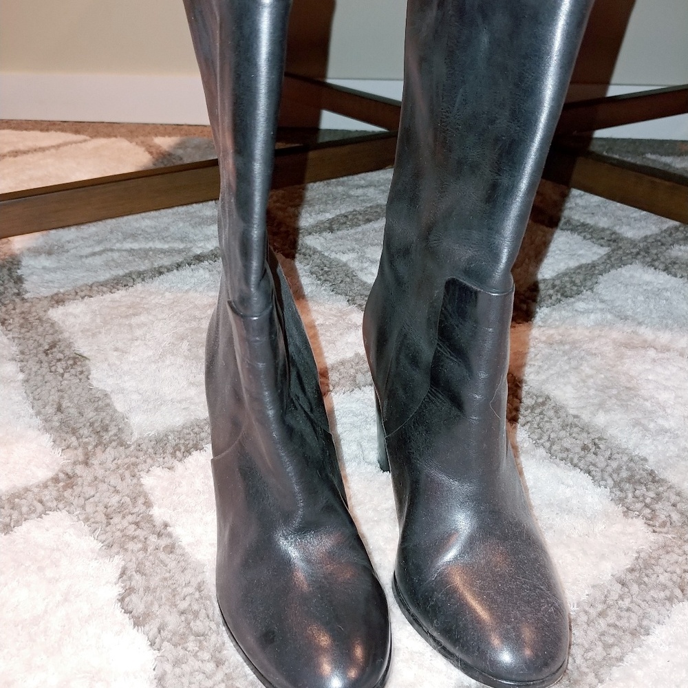 Black high heeled all leather boots
